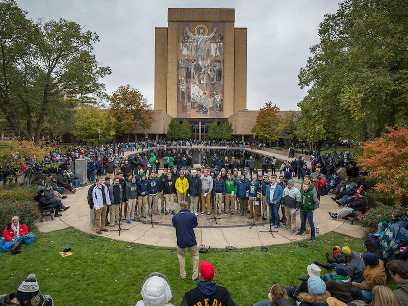 Glee Club performing in front of Touchdown Jesus