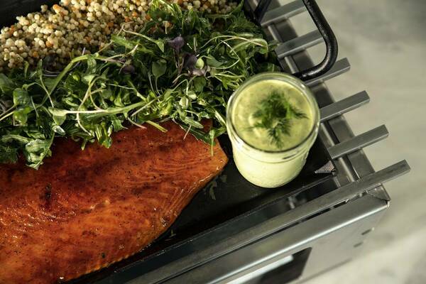 Salmon and a dipping sauce that can be catered from Three Leaf