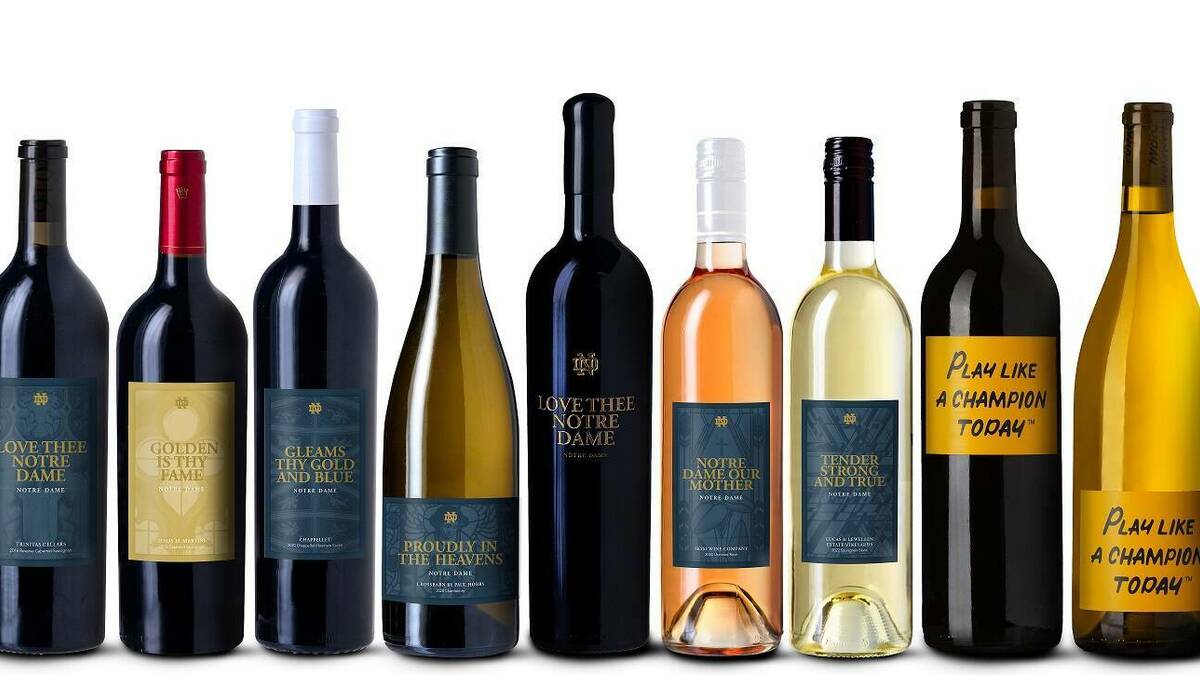A lineup of nine bottles of Notre Dame Family Wines side by side