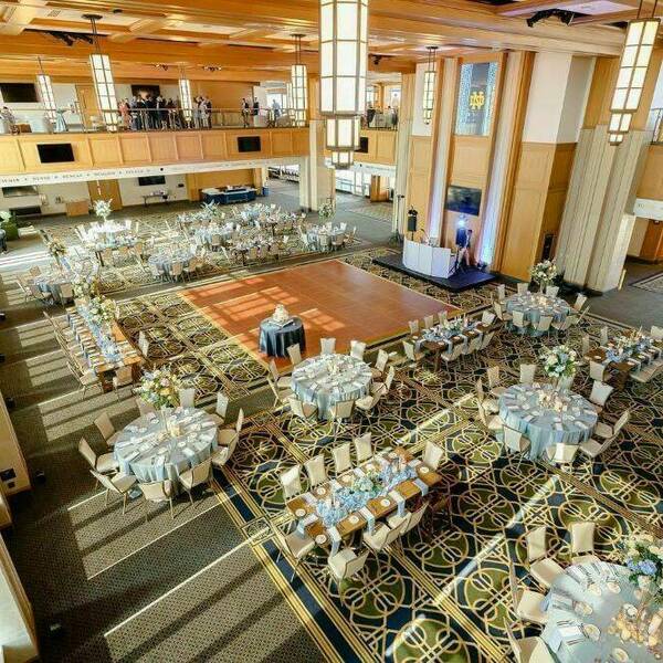 Ariel view of Dahnke Ballroom decorated in light blue and flowers for a wedding.