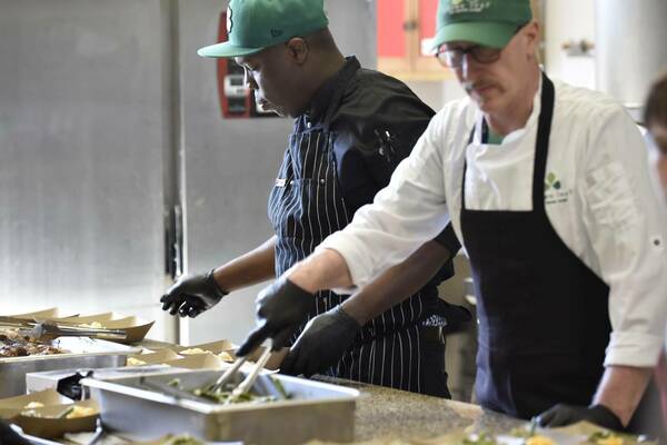 Chef Calvin prepares lunch for Holy Cross Grade School students