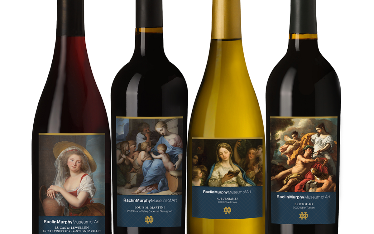 Image of four wine bottles with Raclin Museum of Art labels from the Notre Dame Family Wines collection